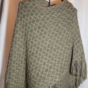 #1207 Fringed asymmetrical poncho.  One size